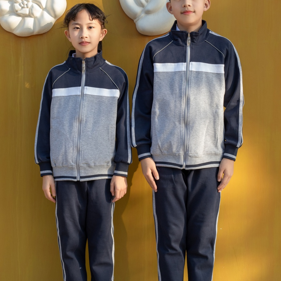 Traje de pista escolar hipoalergénico de marca propia que absorbe la humedad para niños en educación