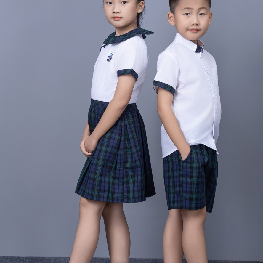 Uniforme escolar elástico de alta calidad al por mayor para escuela primaria