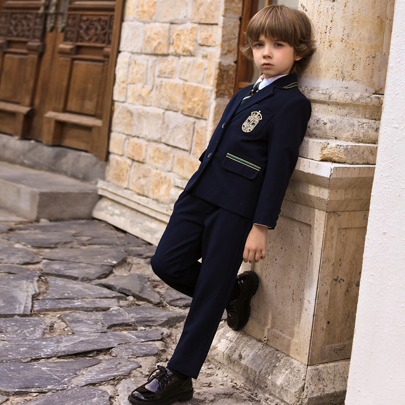 Fabricante chino de uniforme escolar para niños estilo británico, conjunto de blazer, diseño personalizado, falda, pantalones, logo bordado para escuela internacional
