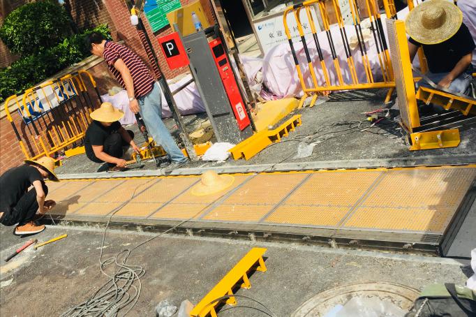 Embedded automatic flood barrier installation