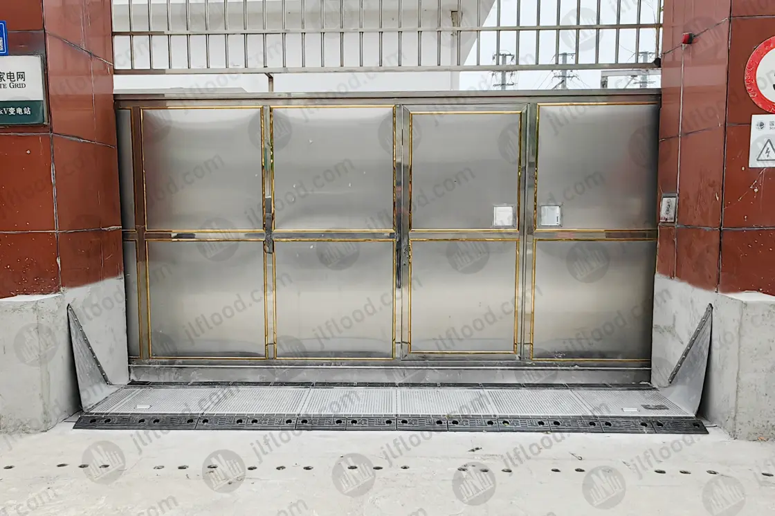 Substation flood barrier protecting electrical equipment gate