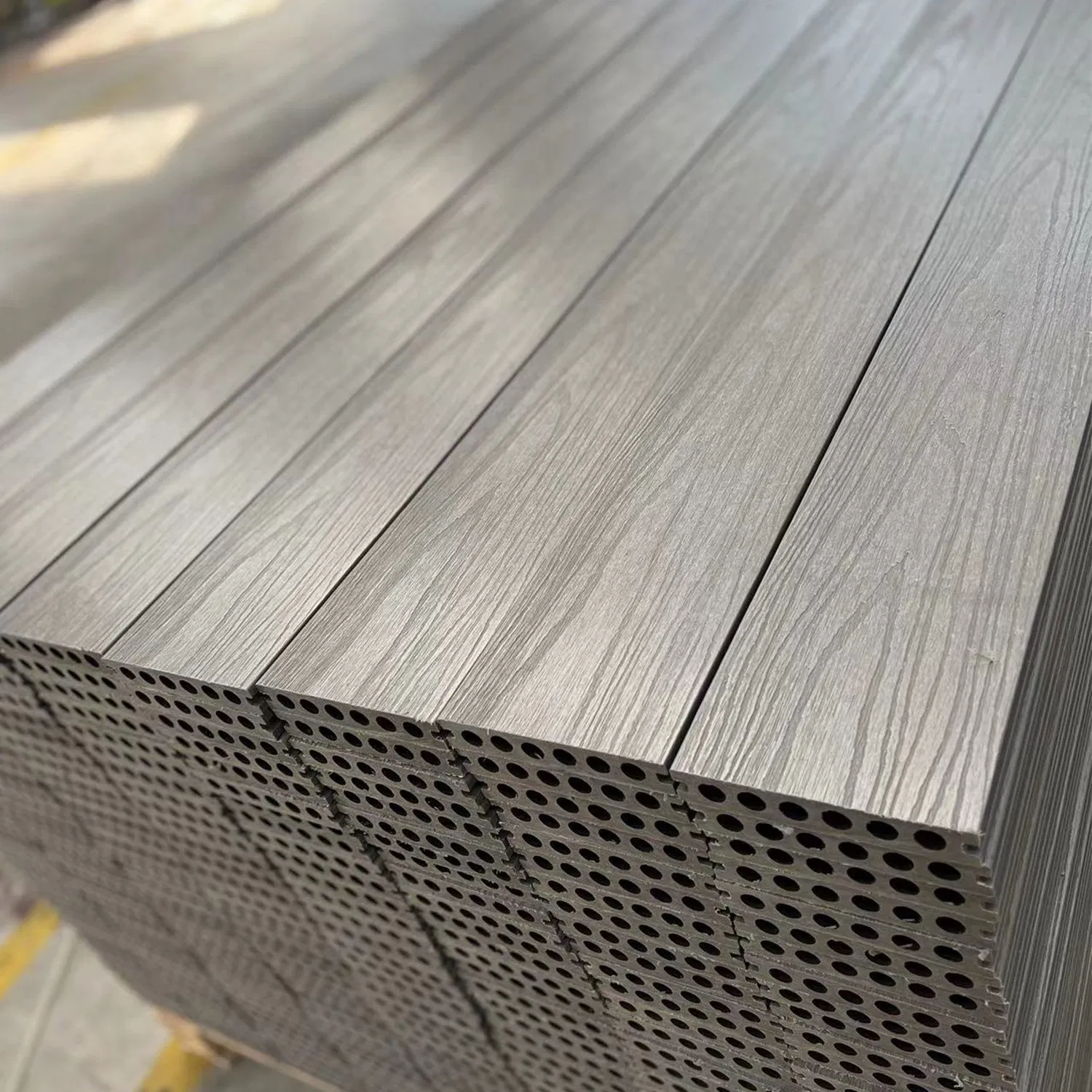 Customizable Co-Extruded Round Hole WPC Decking UV-Resistant Waterproof Outdoor Flooring with Custom Colors &amp; Lengths for Global Buyers