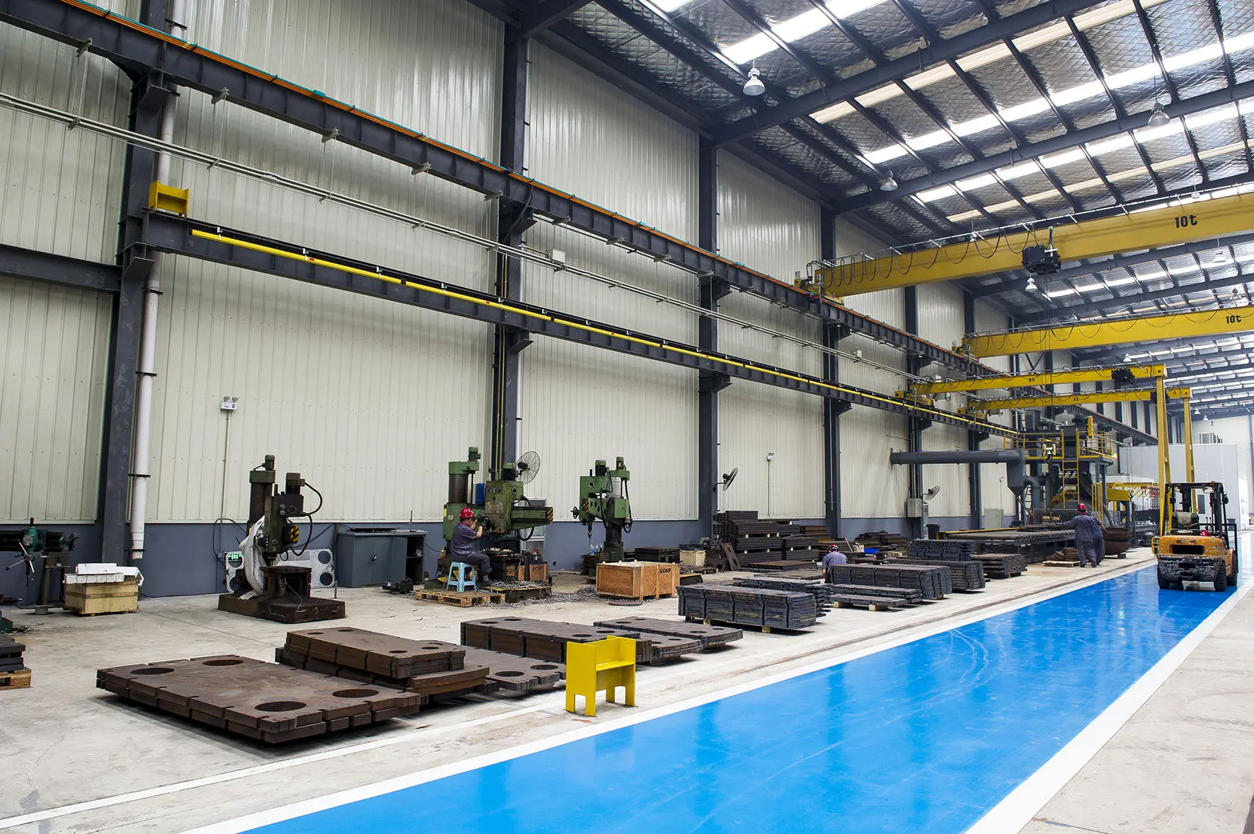 Flotte plate heat exchanger production area with automated stamping equipment