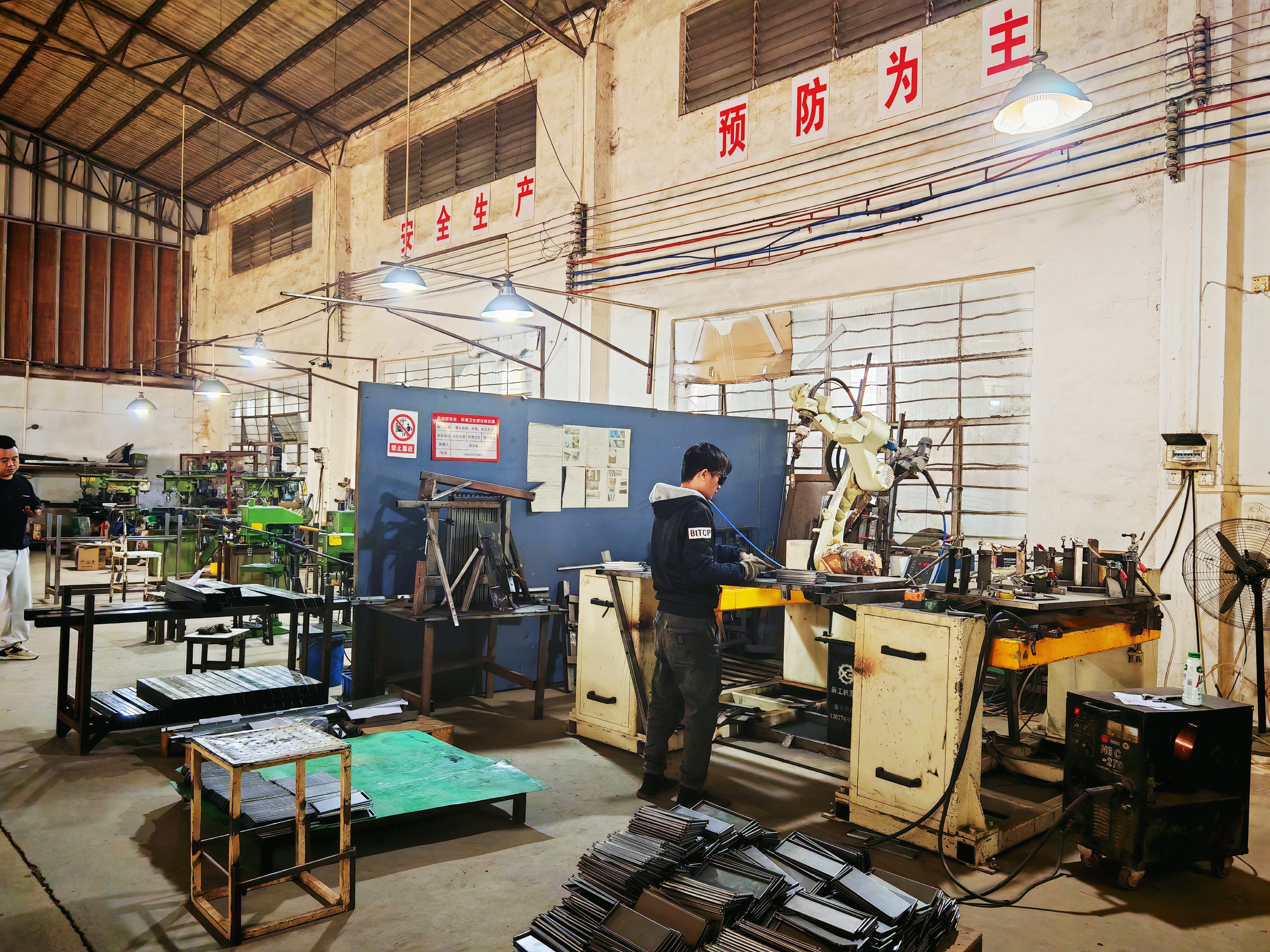 Industrial robot welding arm
