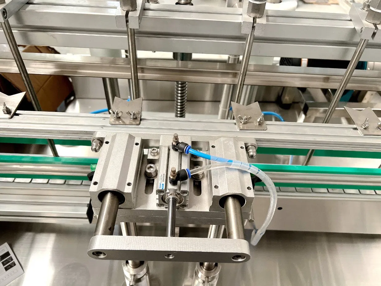 Automatic Saline Bottle Gravity Flow Bottle Feeding Liquid Flavor Filling Capping Labeling Machine Line