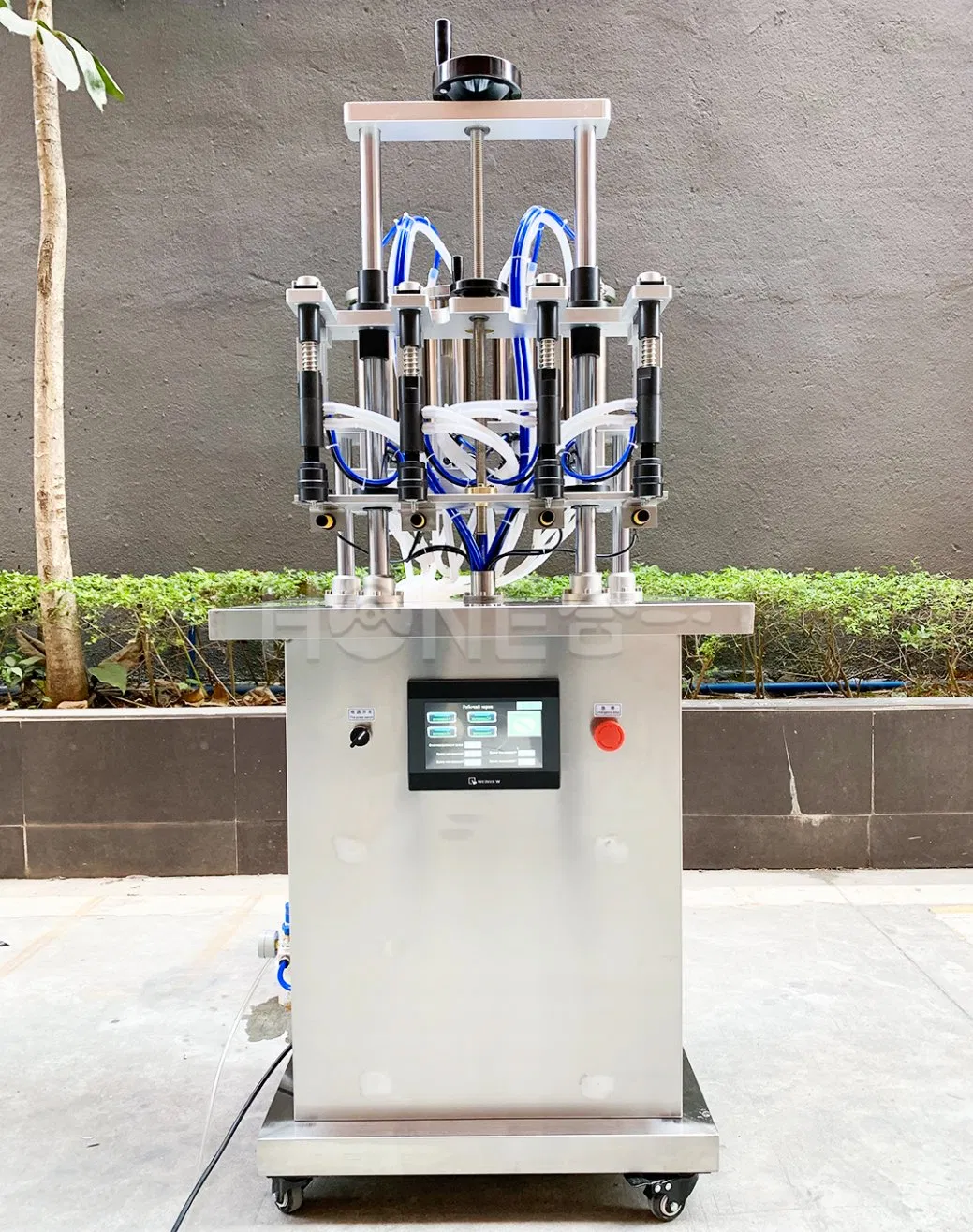 Hone Semi-Automatic Gravity Volumetric Vacuum Perfume Spray Filler Chemical Liquid Filling Machine