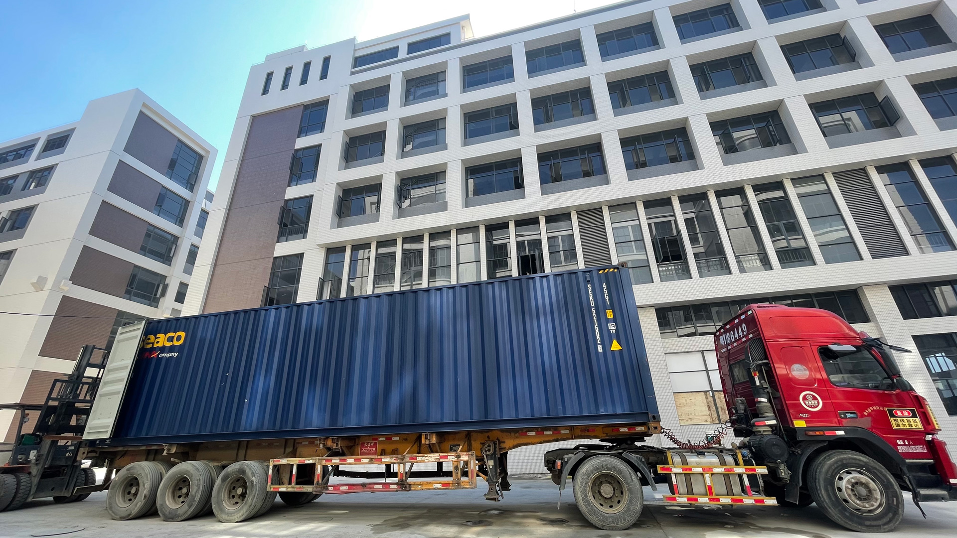 SHANHE machine being loaded into a container for export