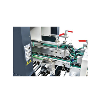 Lower gluing device
