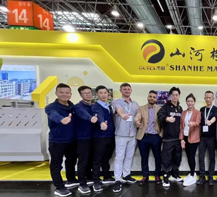 SHANHE MACHINE team at a global printing trade fair