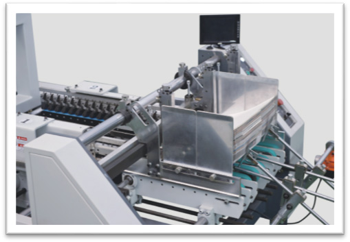 Paper feeding and folding unit