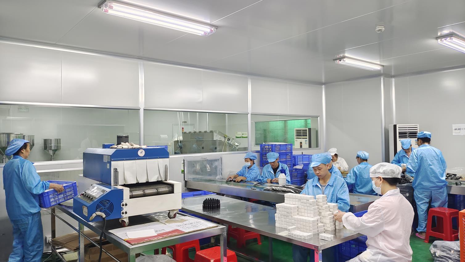 Cosmetics packaging line at Fmo Beauty — assembling and quality checking finished beauty products