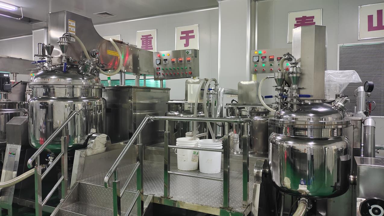 Cosmetics emulsification process in Fmo Beauty factory — blending and mixing ingredients