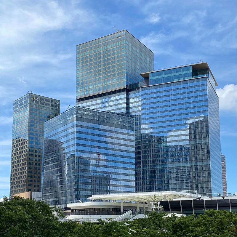 OUNA Panoramic Glass Curtain Wall for Commercial Complex and Shopping Mall Attracts Customers with Transparent Modern Facade