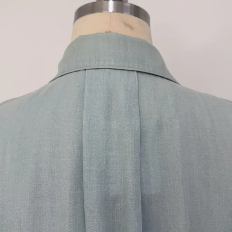 100%Tencel-Lyocell, دنيم مغزول 185GSM (غسيل مبيض) قميص بدون أكمام مزود بأزرار من تينسل