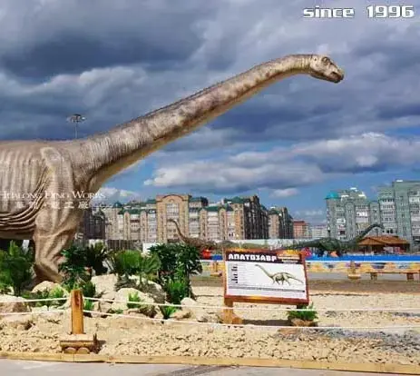 Life-size dinosaur at an outdoor tourist attraction