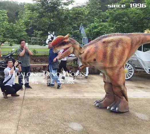 Family visitors at an animatronic dinosaur park