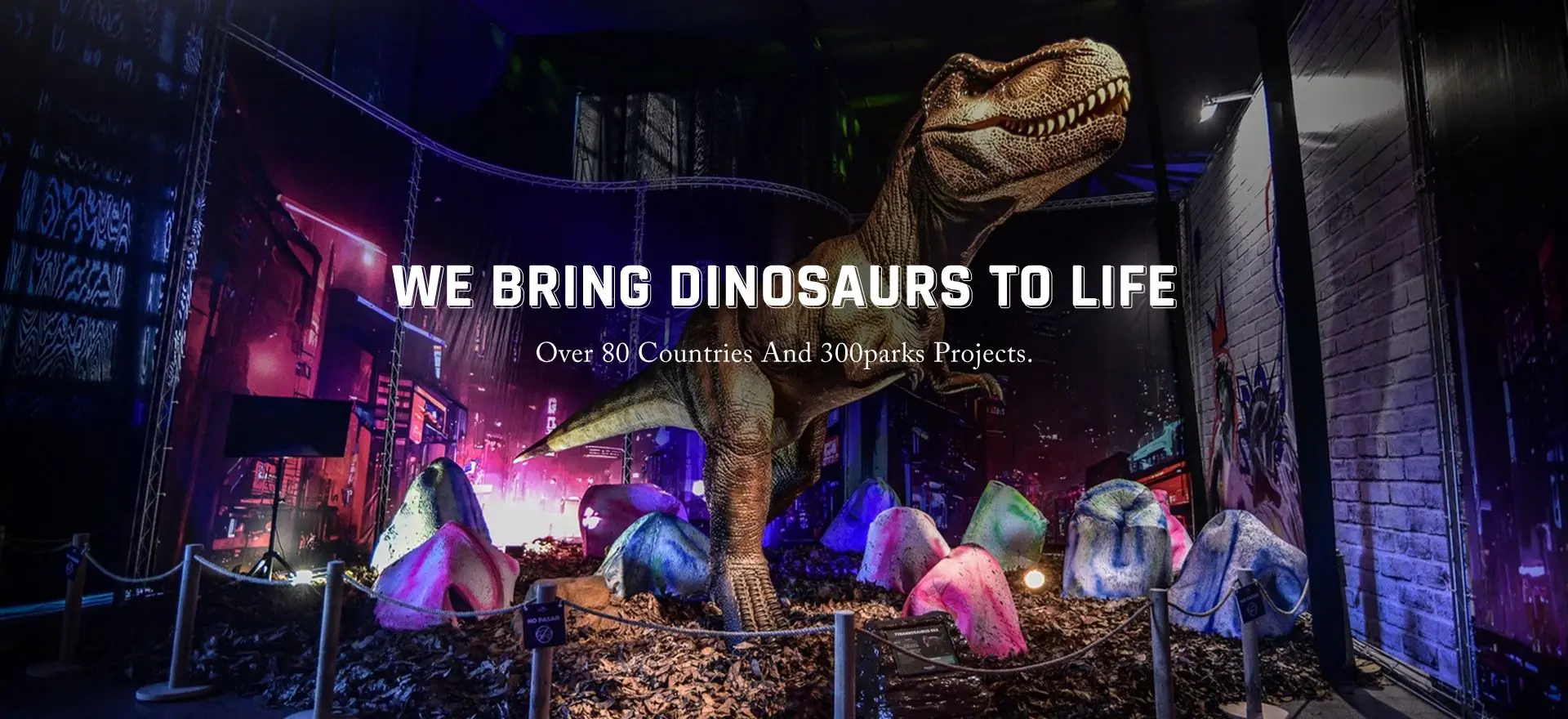 Animatronic T-Rex in aggressive pose at an amusement park