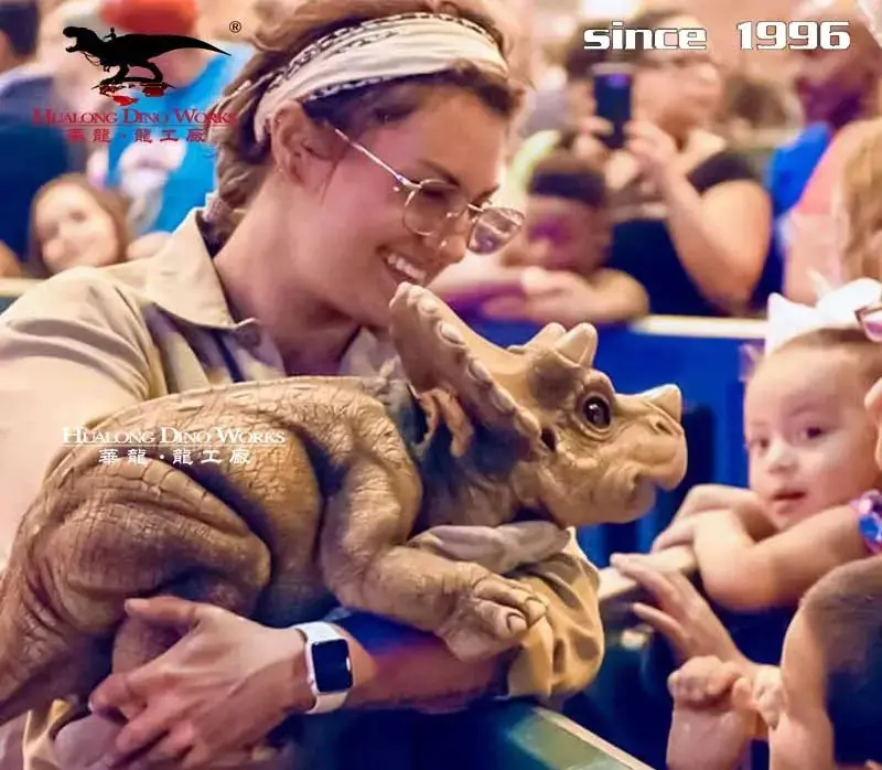 Animatronic dinosaur display inside a shopping mall atrium