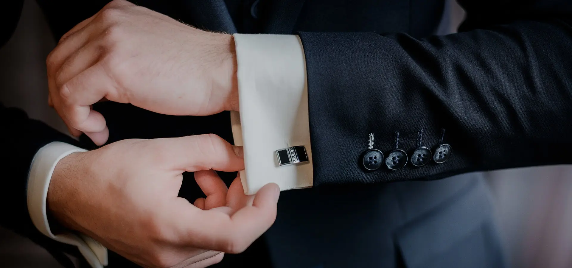 Metal buttons for business suits - shaping silhouette and expressing etiquette for formal occasions