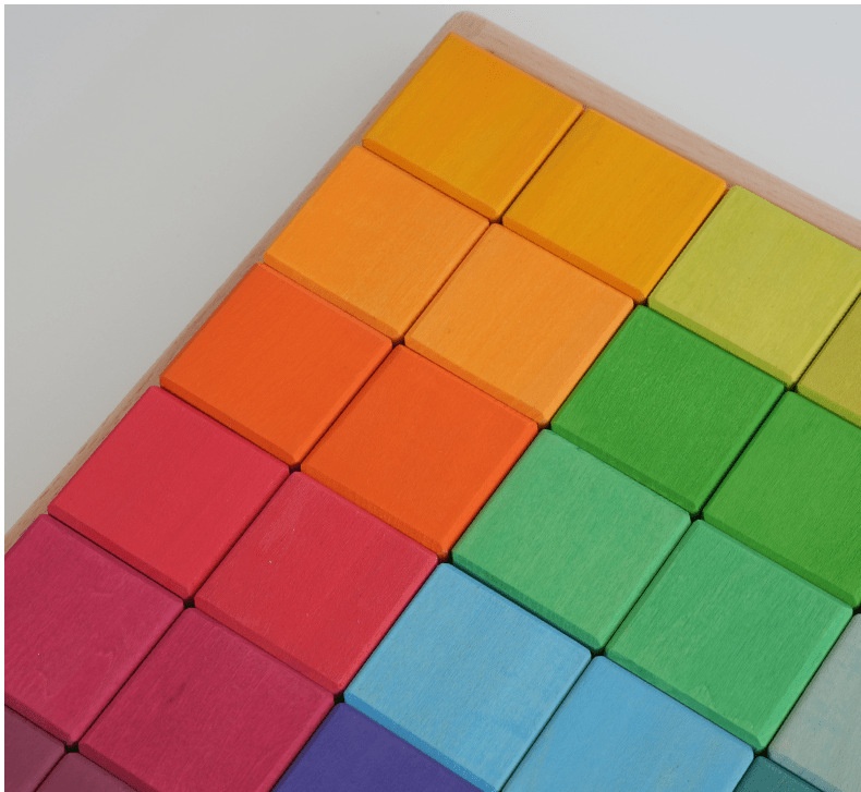 Kids playing with wooden building blocks
