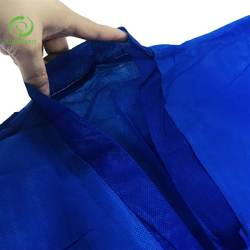 Tela no tejida Sunshine transpirable impermeable azul bata de aislamiento a precio de fábrica