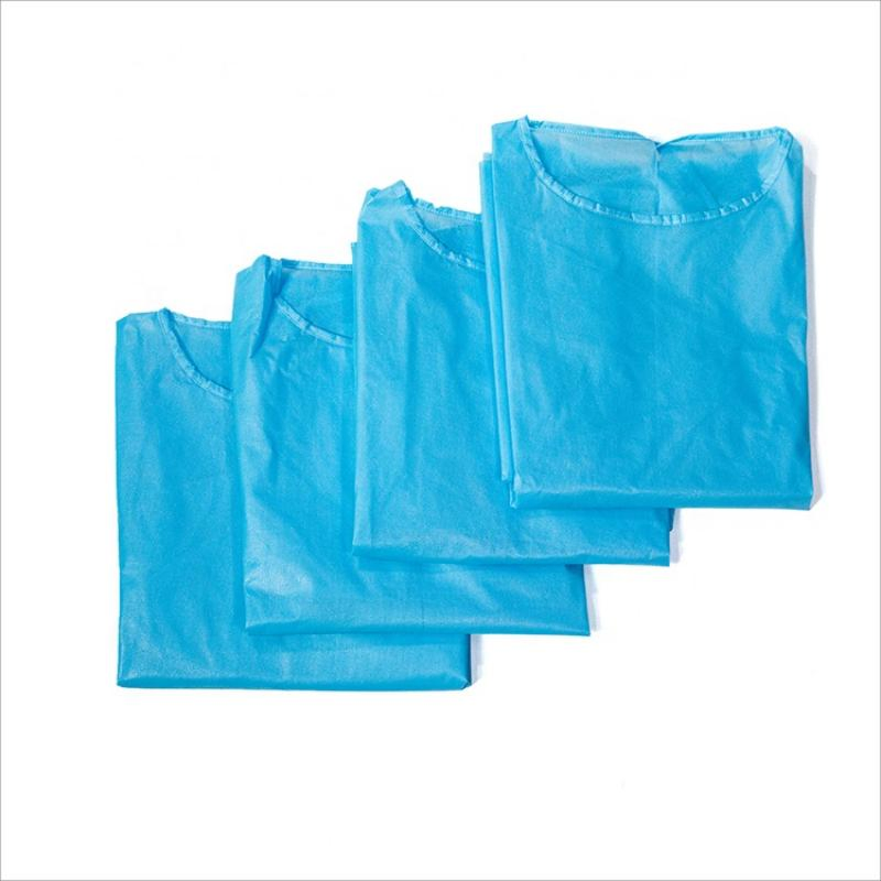 Bata de aislamiento desechable impermeable azul de PP no tejido de nivel AAMI 2 con puño de punto