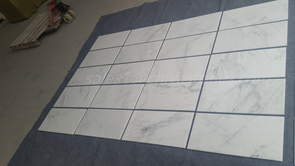 Chinese Factory Cheap Price Natural Pure Oriental White Eastern Carrara Calacatta Volakas Marble Carpet Slab Tiles