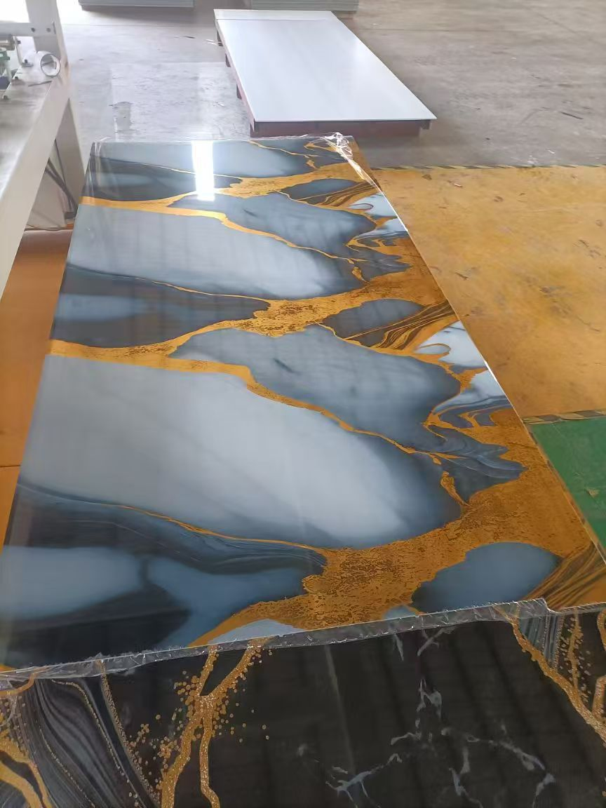 Decoration Material Interior New Design PVC Wall Panel Chinese Factory UV Coating for Use Interior Home Villas Construction Marble Slatted