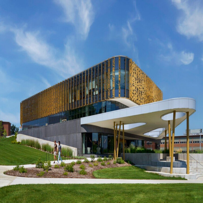 CNC Engraving of Modern Aluminum Alloy Laser-Cut Wall Panels and Facades