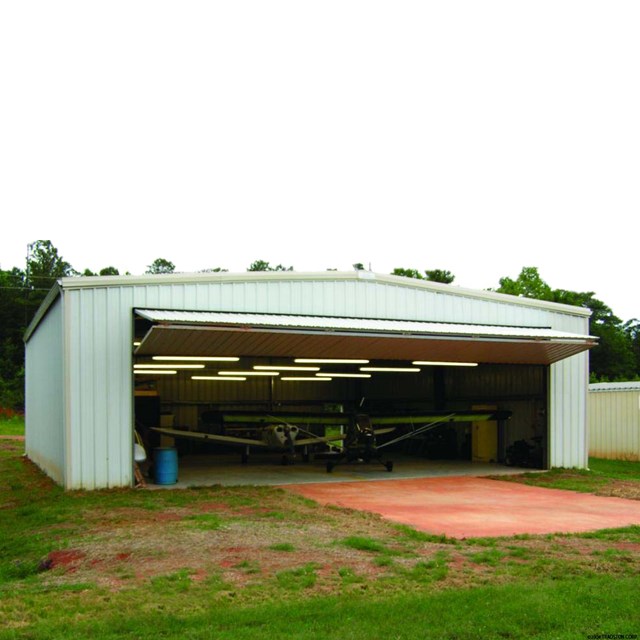 Modern Industrial Light Commercial Steel Insulated Accordion Hangar Door with ASTM Standard Q235/Q345 Steel Construction