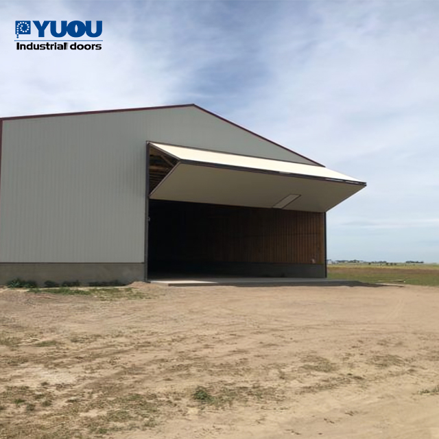 Hot Selling Sandwich Panel Automatic Vertical Folding up Galvanized Steel Material Electrical Folding Hangar Doors