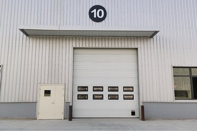 Sectional Door China Suppliers Hot Selling Automatic Lift Industrial Warehouse Overhead Sectional Door With Pedestrian Door