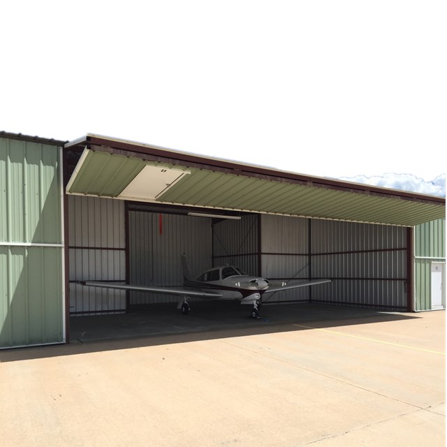 Modern Industrial Light Commercial Steel Insulated Accordion Hangar Door with ASTM Standard Q235/Q345 Steel Construction
