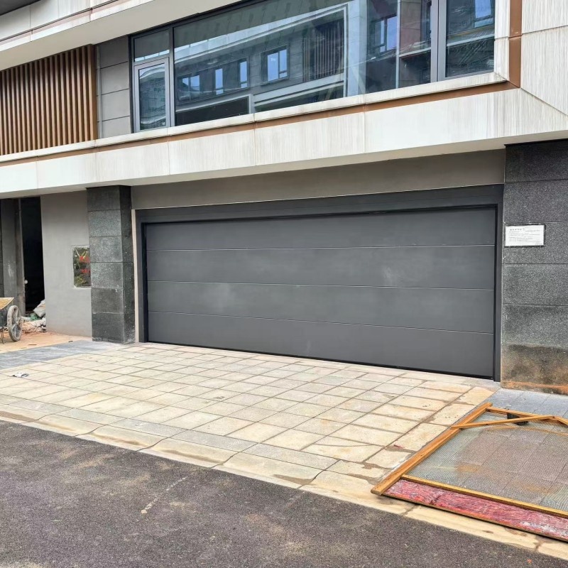Modern Black Sectional Garage Door Insulated Automatic Overhead Door with Round Porthole Windows for Villa Home Use