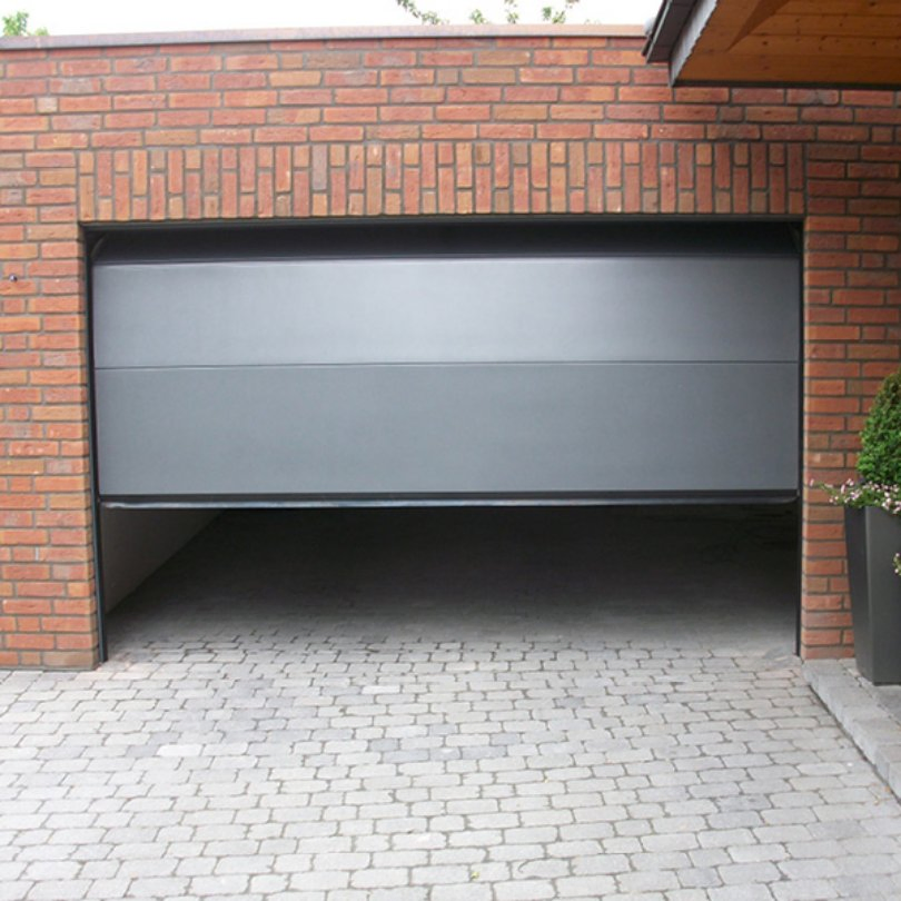Pressure-Treated Sectional Garage Door for Resisting Rot in Humid Environments
