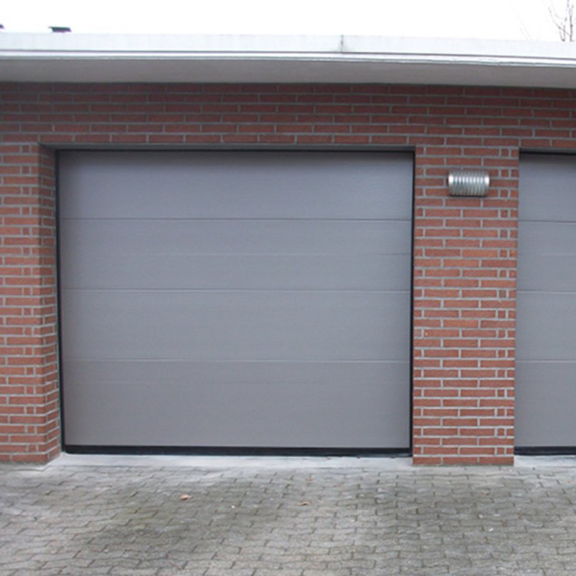 Pressure-Treated Sectional Garage Door for Resisting Rot in Humid Environments
