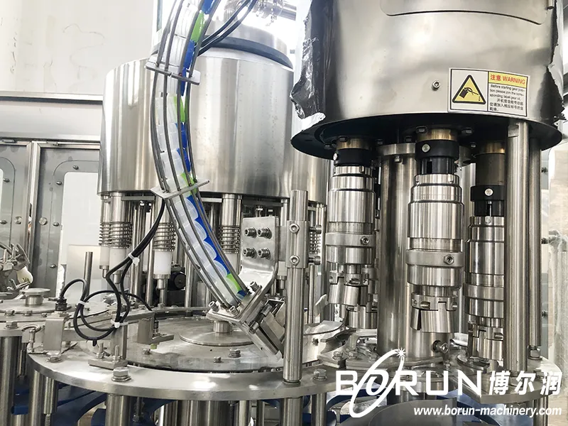 Glass bottle filling heads