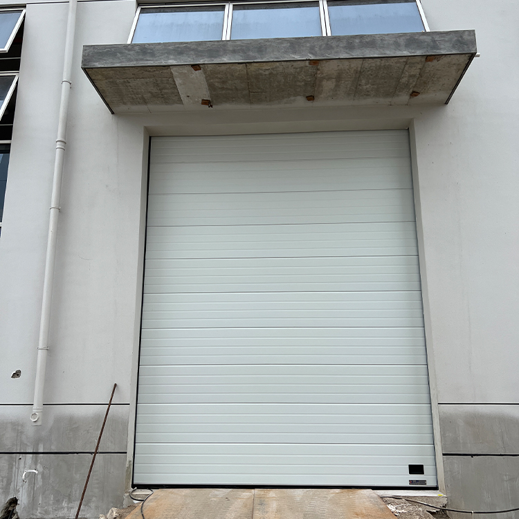 Industrial Automatic Thermal Insulated Vertical Lifting Exterior Sectional Door for Loading Docks