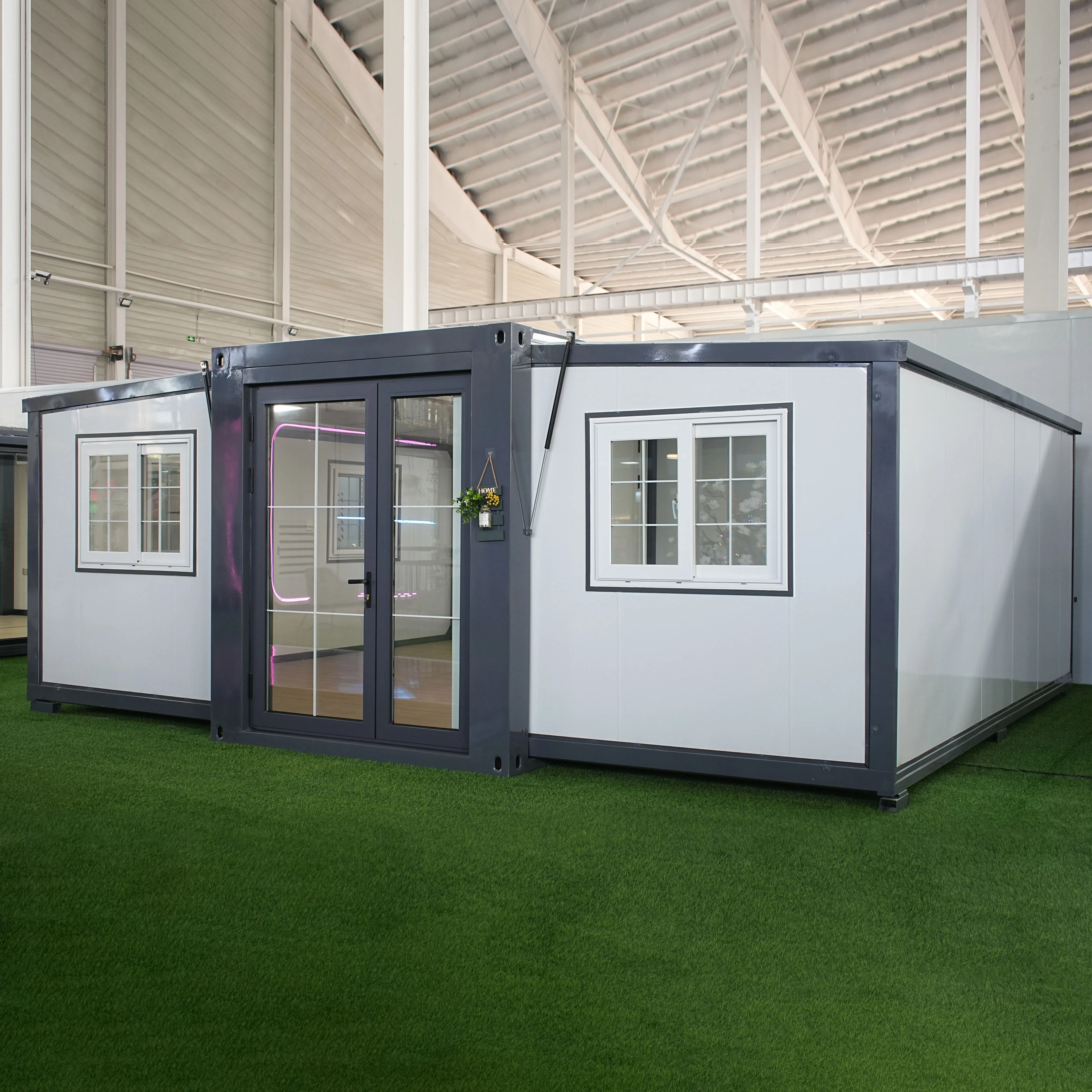 Portable Expandable Living Unit with Integrated Kitchen and Bath