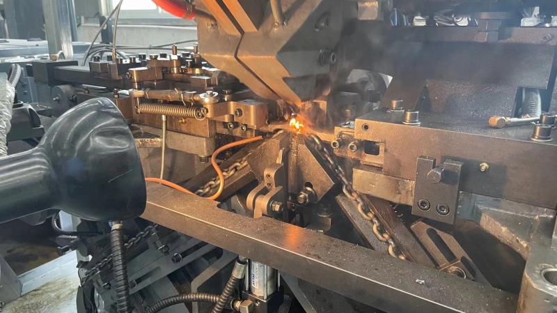 Automatic chain welding production line at Glinder Lift manufacturing facility