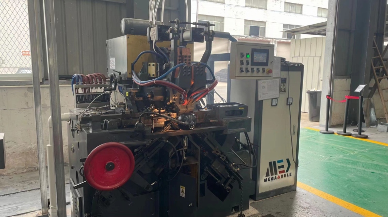 Automatic chain welding machine used in Glinder Lift manufacturing operations