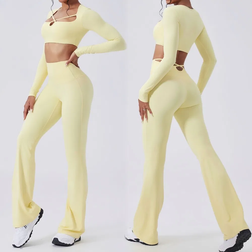 Conjunto de ropa activa elegante y sexy de Tianchen Wholesale 2, top de entrenamiento corto de manga larga + leggings acampanados, ropa de fitness para yoga y pilates para mujer