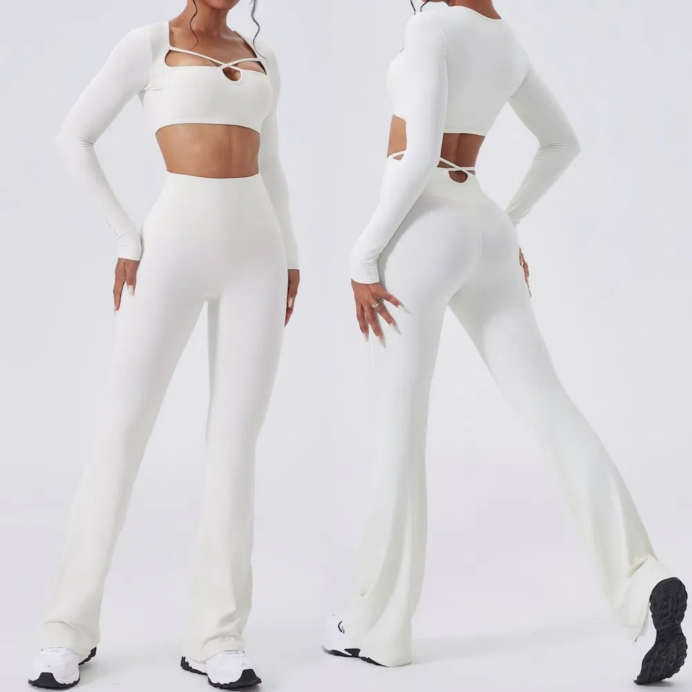Conjunto de ropa activa elegante y sexy de Tianchen Wholesale 2, top de entrenamiento corto de manga larga + leggings acampanados, ropa de fitness para yoga y pilates para mujer