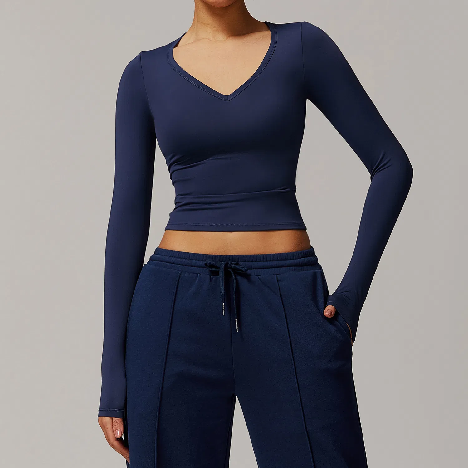 Camiseta deportiva de manga larga para mujeres, ajustada, de secado rápido, ideal para yoga, running y fitness, que estiliza