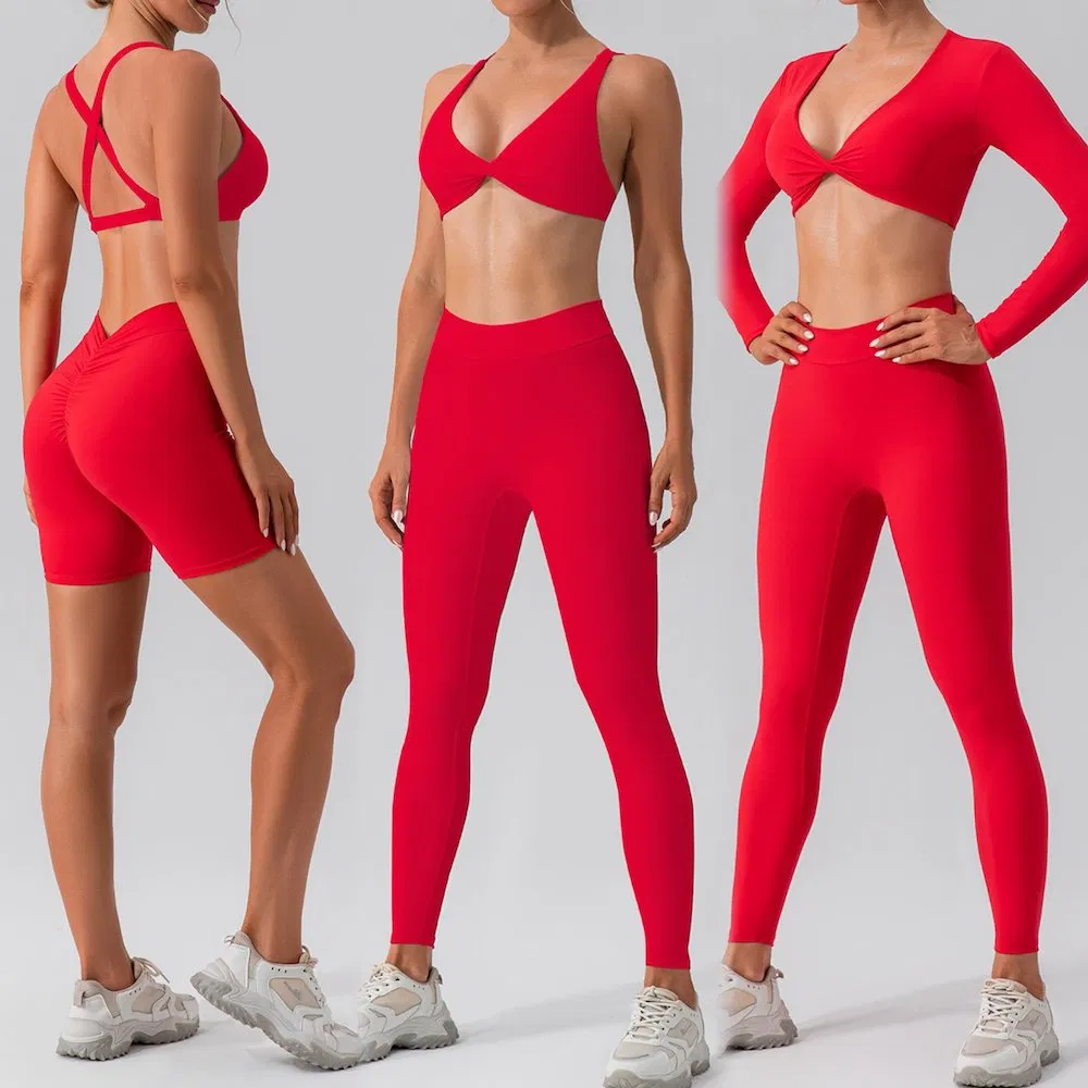 Ropa de fitness para mujeres al por mayor 4PCS traje deportivo sexy con escote en V para correr al aire libre, sujetador de yoga con logo personalizado + top corto + pantalones cortos con fruncido en la parte trasera + pantalones