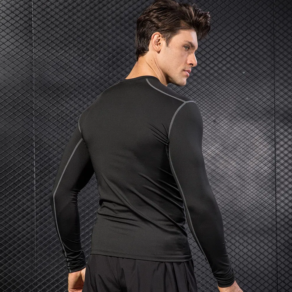 Camisa de entrenamiento ajustada para hombres de fábrica al por mayor, deportiva, para fitness, running, que absorbe el sudor y se seca rápidamente, de manga larga