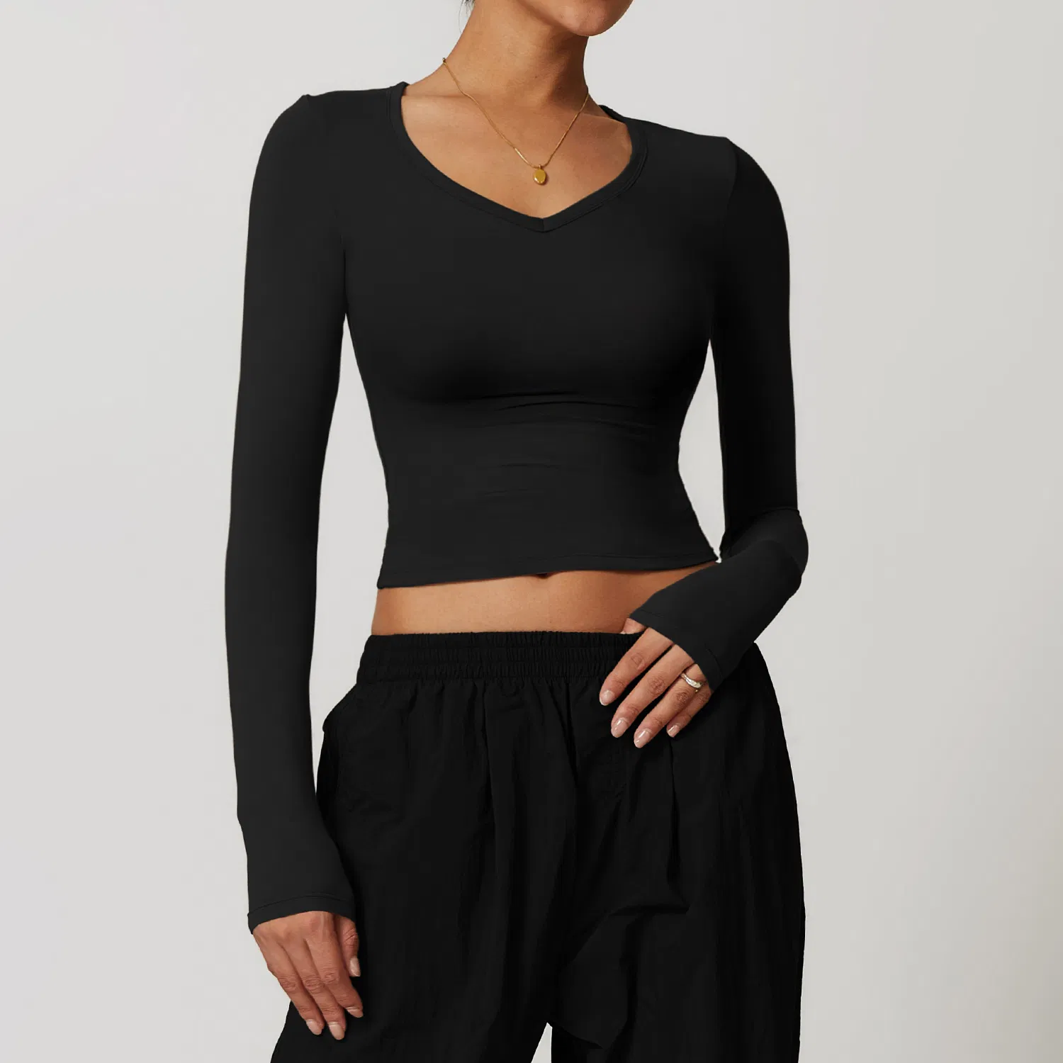 Camiseta deportiva de manga larga para mujeres, ajustada, de secado rápido, ideal para yoga, running y fitness, que estiliza