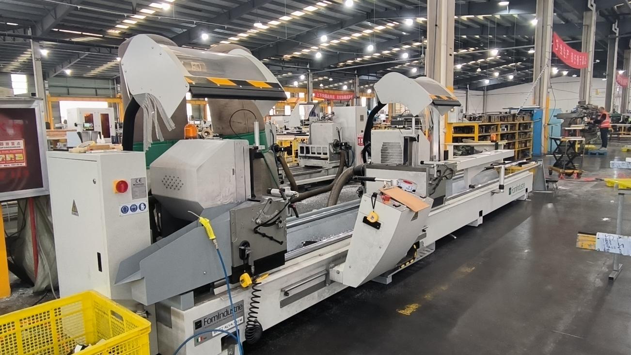 Automated cutting stage for door glazing and bead frames