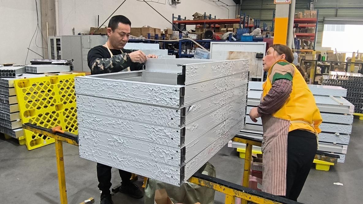 QA team inspecting semi-finished door products