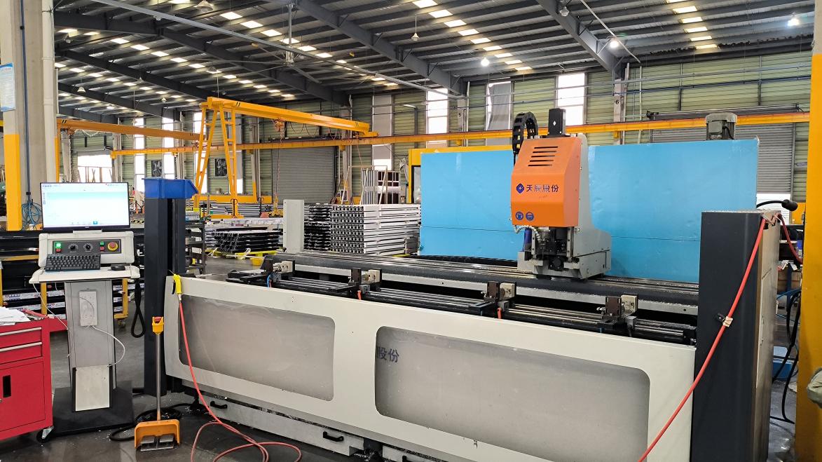 High speed CNC drilling machine creating hardware holes